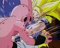 Super Saiyan 3 Goku punches Kid Buu