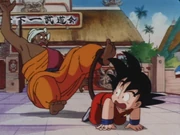 Goku trips Nam with the use of his tail