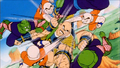 Piccolo and Krillin caught in Nappa's onslaught