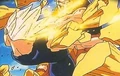 Goku uses another rock slab to bash Vegeta