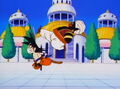 Mr. Popo kicking Goku in the back of the head