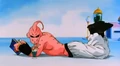 Super Buu reading and drinking a cocktail