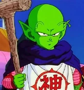 Dende utilizando el kanji "KAMI".