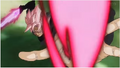 Super Saiyan Rosé Goku Black firing Continous Energy Bullets at Goku