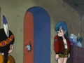 Bulma hides inside the house.