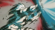 Goku usando el Kaio-ken mientras lanza un Kamehameha