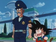 A West City policeman with Goku
