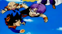 Goten and Trunks playing with Krillin