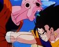 Vegito punches Super Buu in the stomach