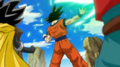 Goku deflects Broly's attack