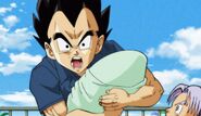 Vegeta holding his new born daughter