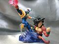 Imagination Series Baby versus Super Saiyan 4 Goku side view