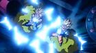 Goten charges a Super Kamekameha together with Trunks' Buster Cannon in Bio-Broly