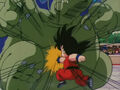 Goku punches Giran in the stomach