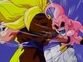 Goku punches Buu in the stomach