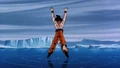 Goku charges a Spirit Bomb in the Glacier in Super Android 13!