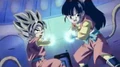 The Saiyan Hero and Heroine charge a Multiple Kamehameha