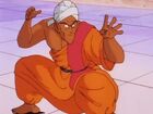 Nam takes a battle stance after attempting to kick Goku