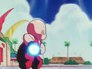 Krillin charges a Kamehameha to fire at Chiaotzu