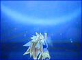 GT Goku gathers energy to perform a Dragon Fist in Infinite World