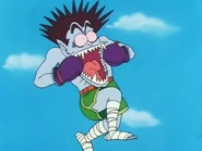 Dracula Man adolorido luego de morder a Pu'er transformado en puercoespín.