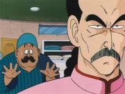 Tao with the tailor, who just asked for money for his services