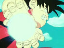 Goku charges his Kamehameha to fire at the old King Piccolo