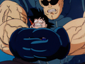 Major Metallitron holds Goku in a tight grip