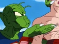 King Piccolo blows a rock at Goku