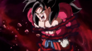 Xeno Goku struggling to break free from Cumber's dark energy restraints.