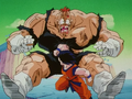 Goku elbow strikes Recoome in the stomach