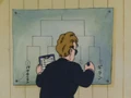 The announcer scribbles Goku's name
