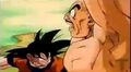 Nappa punched in the stomach by Goku