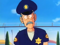 Policeman wondering how Goku knew Bulma was arriving