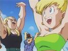 Sharpner and Erasa give energy to Goku's Spirit Bomb