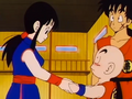 Krillin blushes when Chi-Chi holds his hands