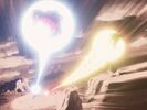 Krillin's Kamehameha and Piccolo's Makosen fired at Nappa