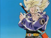 Super Saiyan Future Trunks charges the Burning Attack using his simultaneous hand movements