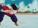 Goku kicks Piccolo in the face