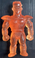 Part 6 Keshi Tora transparent orange figurine front view