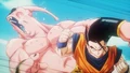 Ultimate Gohan hits Super Buu with Ultimate Knuckle in flashback