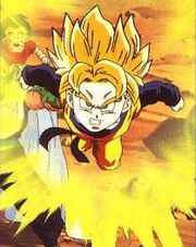 Super Saiyan Goten rushes to help Vegeta fight Majin Buu