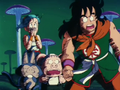 Yamcha watches in shock as a missile hits Great Ape Goku