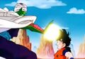 Piccolo charges an Explosive Demon Wave at Gohan's face