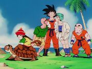 Goku,Roshi,KrillinAndGohanOnATurtle