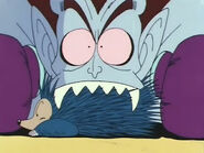 Dracula Man mordiendo a Pu'er transformado en puercoespín.