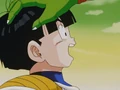 Piccolo places his hand upon Gohan's head