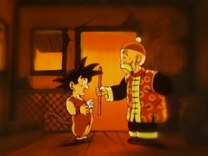 Goku recibiendo el Báculo