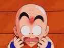 Krillin bloodied after being hit by Jackie Chun