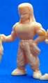 Part 21 Keshi Sharpner tan figurine front angle view